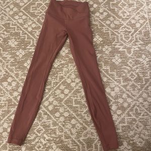 luluemon leggings with cross cross waistband